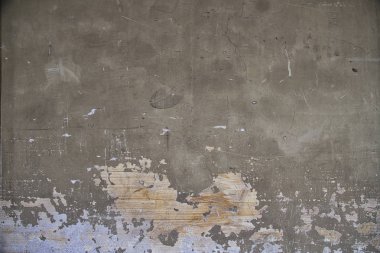 Arka plan görüntüleri için yıpranmış ve yaşlı alçı duvar detayı.