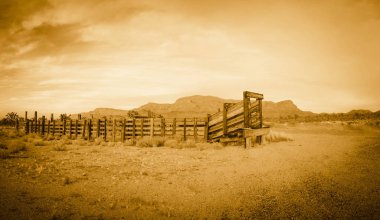 Panorama of an old western corral in the desert of Arizona