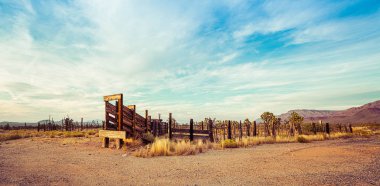 Panorama of an old western corral in the desert of Arizona