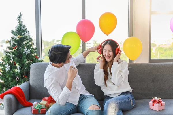 Happy New Year, Xmas and couple concept. Asian young man and wom