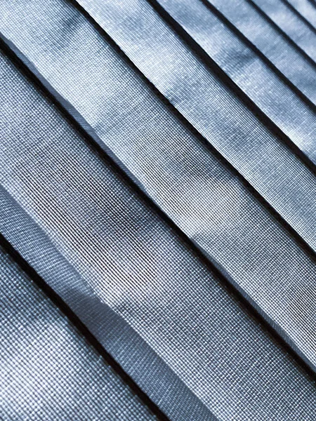 Cloth textiles background. Stripes texture blue pattern