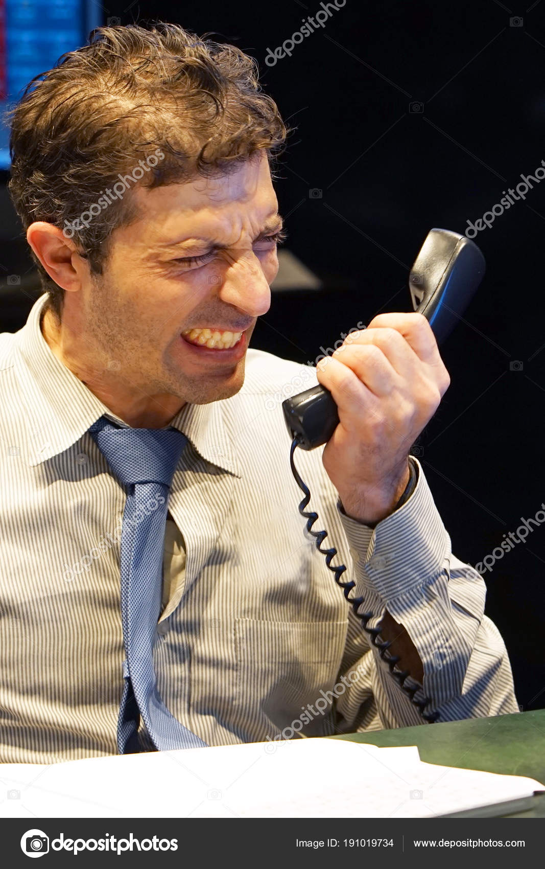 Secretary answering phone calls Stock Photo by ©svershinsky 191019734