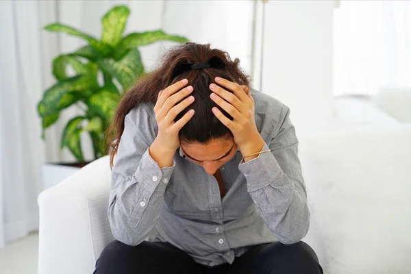 The teenager girl's headache. Girl squeezes her head — Stock Photo, Image