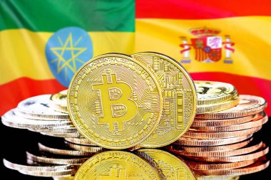 Etiyopya ve İspanya bayrak arkaplanındaki bitcoinler