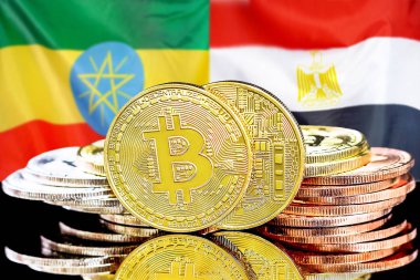 Etiyopya ve Mısır bayrak arkaplanındaki Bitcoinler