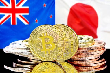 Yeni Zelanda ve Japonya bayrak arkaplanındaki Bitcoinler