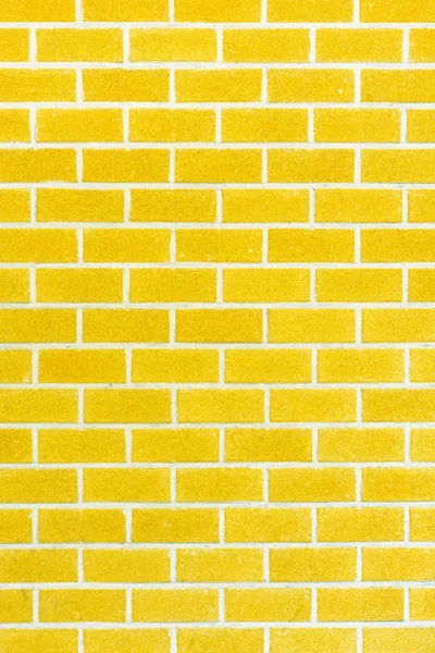 Žlutá cihlová zeď pozadí — Stock fotografie