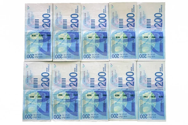 Israelische Geldscheine isoliert auf weißem Hintergrund. — Stockfoto