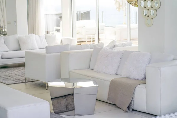 White room with sofa. Sofa in lounge for relaxation.