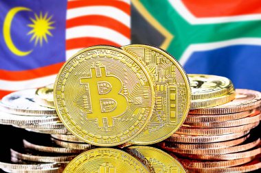 Malezya ve Güney Afrika arkaplanındaki Bitcoinler.