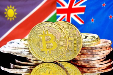 Namibya ve Yeni Zelanda bayraklarında Bitcoins.