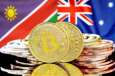 Namibya ve Avustralya bayraklarında Bitcoins.