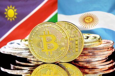 Namibya ve Arjantin bayraklarında Bitcoins.