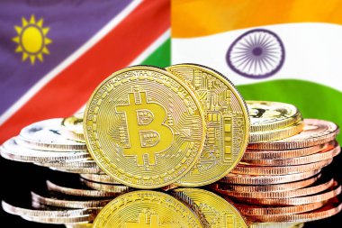 Namibya ve Hindistan bayrak arkaplanındaki bitcoinler.