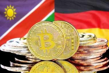 Namibya ve Almanya bayraklarında Bitcoins.