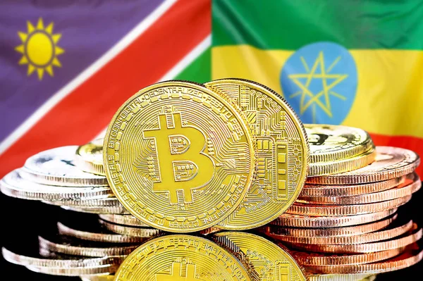Namibya ve Etiyopya bayrağı arkaplanındaki bitcoinler.