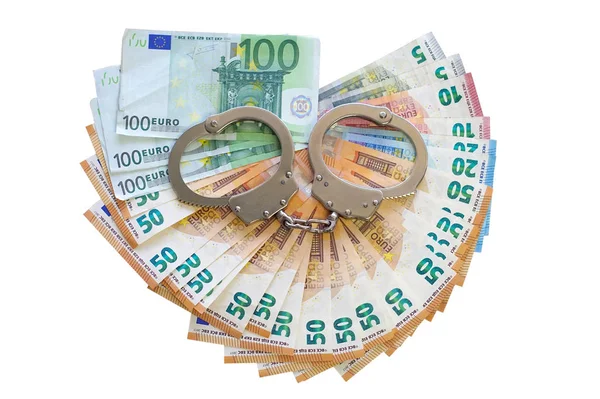 Menottes sur fond de billet en euros isolé sur un blanc — Photo