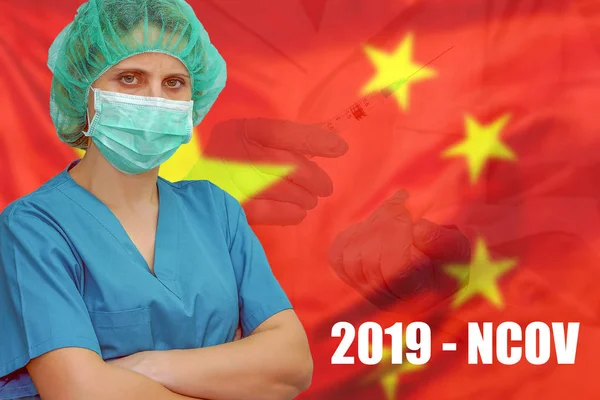 Influenza from coronavirus, prevention of pandemic virus infection. Surgeon or doctor in a mask and hat looks at the camera on Chinese flag background.