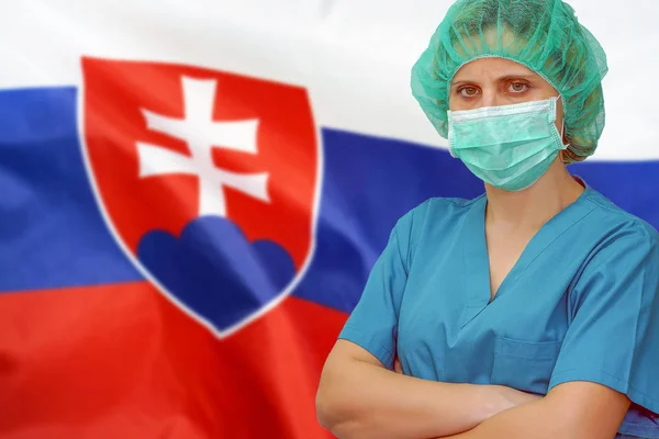 Woman surgeon on the background of the Slovakia flag. Health care, surgery and medical concept in Slovakia.