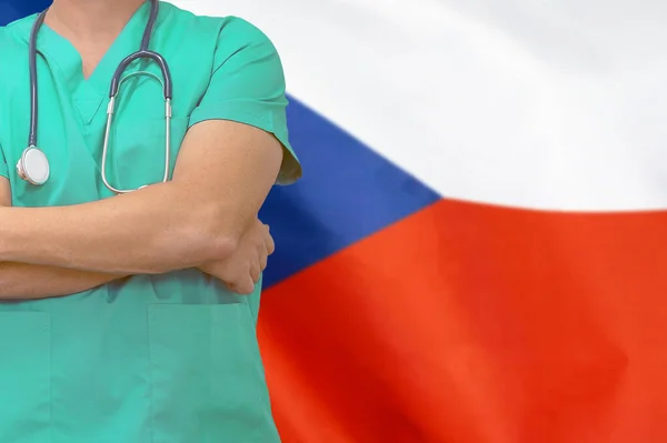 Male surgeon or doctor with stethoscope on the background of the Czech Republic flag. Health care and medical concept. Surgery concept in Czech Republic.