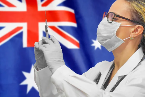 Female Doctor Nurse Gloves Holding Syringe Vaccination Background Australia Flag — Stock Photo, Image