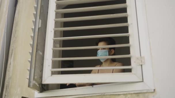 Woman Opens Window Takes Face Mask Breathing Fresh Air Her — Stock Video