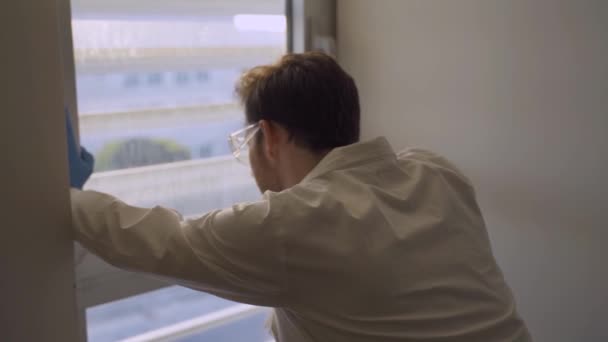 Disappointed Doctor Scientist Shaking His Head Next Lab Hospital Window — Stock Video