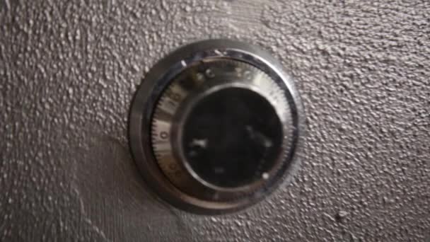 Close Up - hand closing a safe and locking it with combination lock — Stock Video