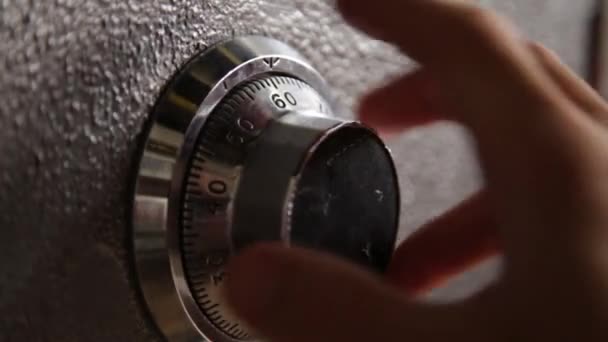 Locking and then opening a safe - close up on dial — Stock Video
