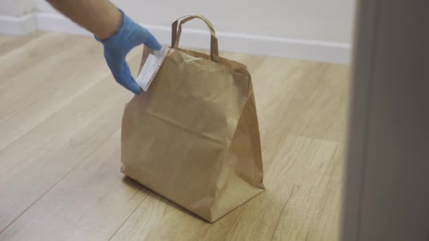 Delivery Door Hand Latex Glove Picks Take Out Food Hallway — Stock Video