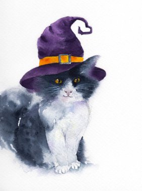 Mor cadı şapka ile şirin kedi. 