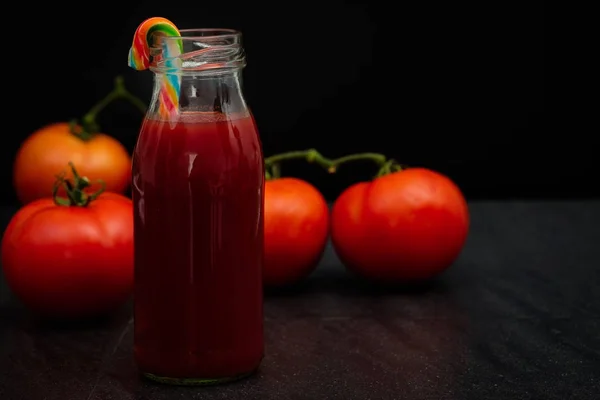 Still life of fresh ripe tomatoes juice — Stock Photo, Image