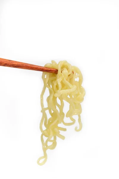 Instant noodles on chopstick isolated on white background — Stock Photo, Image