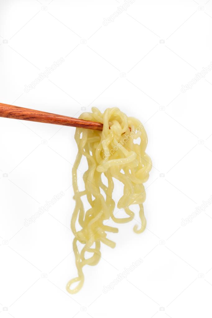Instant noodles on chopstick isolated on white background