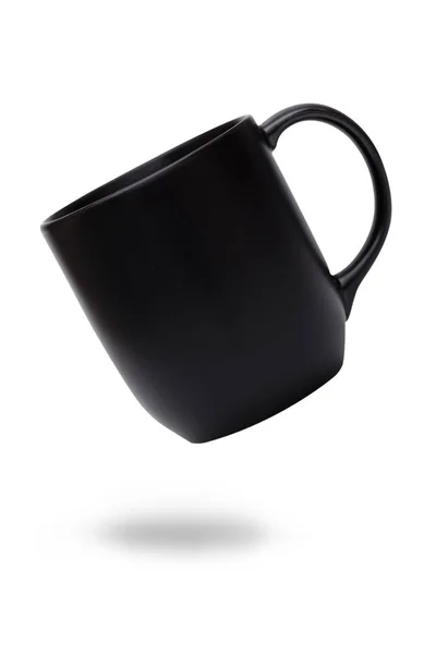 Tasse en céramique noire ou tasse de café isolée sur blanc . — Photo