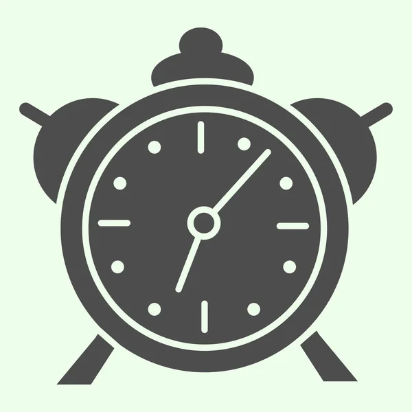 目覚まし時計の固体アイコン。白の背景に古典的なレトロなテーブルクロックグリフスタイルのピクトグラム。モバイルコンセプトとウェブデザインのモーニングコールウォッチ。ベクトルグラフィックス. — ストックベクタ