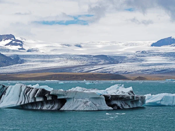 Blue ice block in glacier ice in the Jokulsarlon lagoon in south