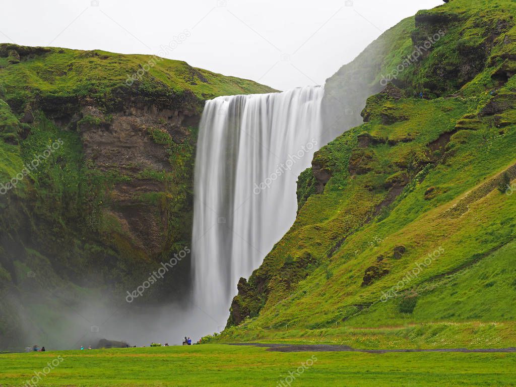 Beautiful Skogafoss waterfall in Iceland - long exposure melted