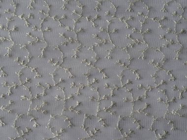 eski moda nazik gümüş dantel dokulu bitkisel süsler ile