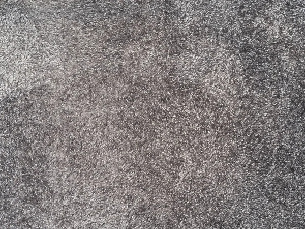 Cerrar suave alfombra gris textura fondo — Foto de Stock