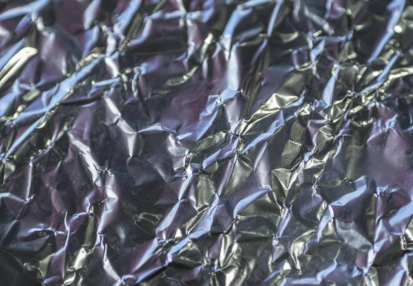 Close up crumpled aluminium tinfoil silver background — Stock Photo, Image