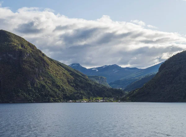 Beautiful Norwegian fjord. View across Storfjorden, towards village Eidsdal. Summer, blue sky. Norway — Stock Photo, Image