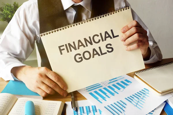 Business photo shows hand written text Financial Goals — Stock Photo, Image