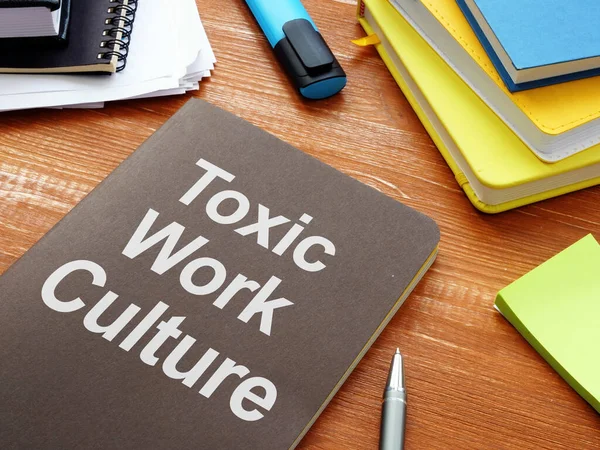 Toxic Work Culture is shown on the business photo