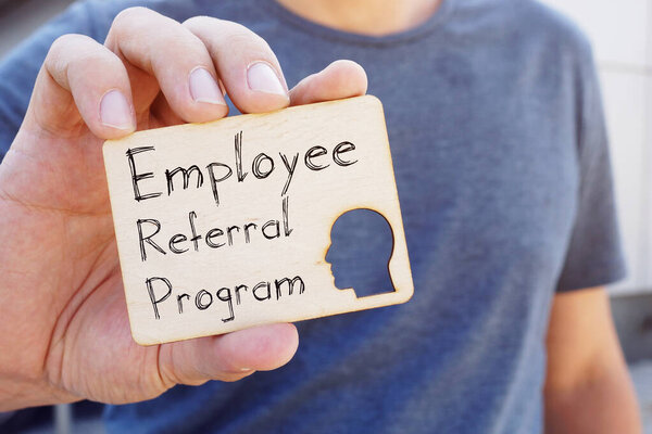 Employee Referral Program is shown on the conceptual business photo