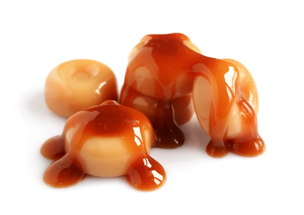 Cukierki karmelowe i płynny Karmel — Zdjęcie stockowe
