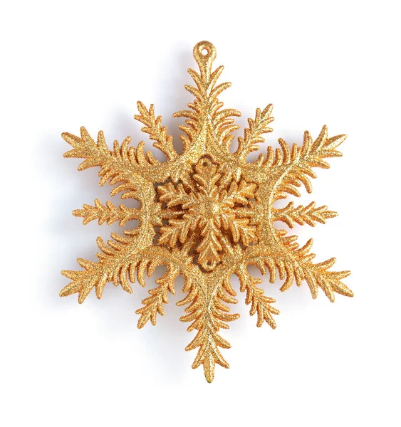 Flocon de neige décoratif de Noël doré — Photo
