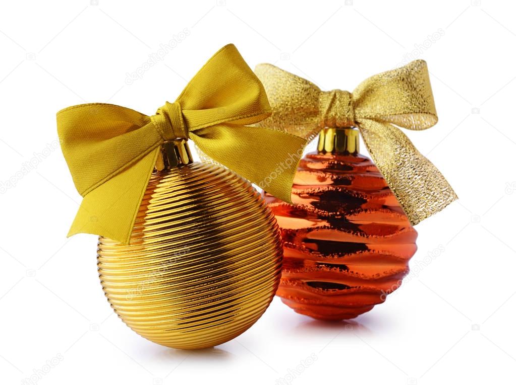 Golden Christmas balls with ribbon bows