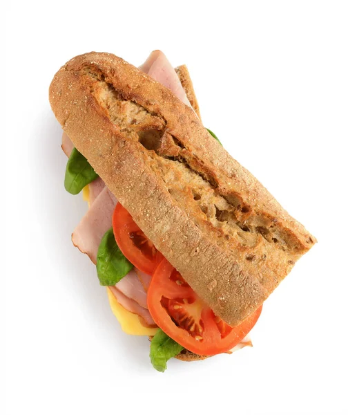 Sandwich met ham, tomaat, kaas en basilicum — Stockfoto