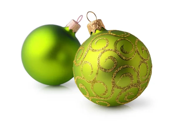 Twee groene en gouden kerstballen — Stockfoto